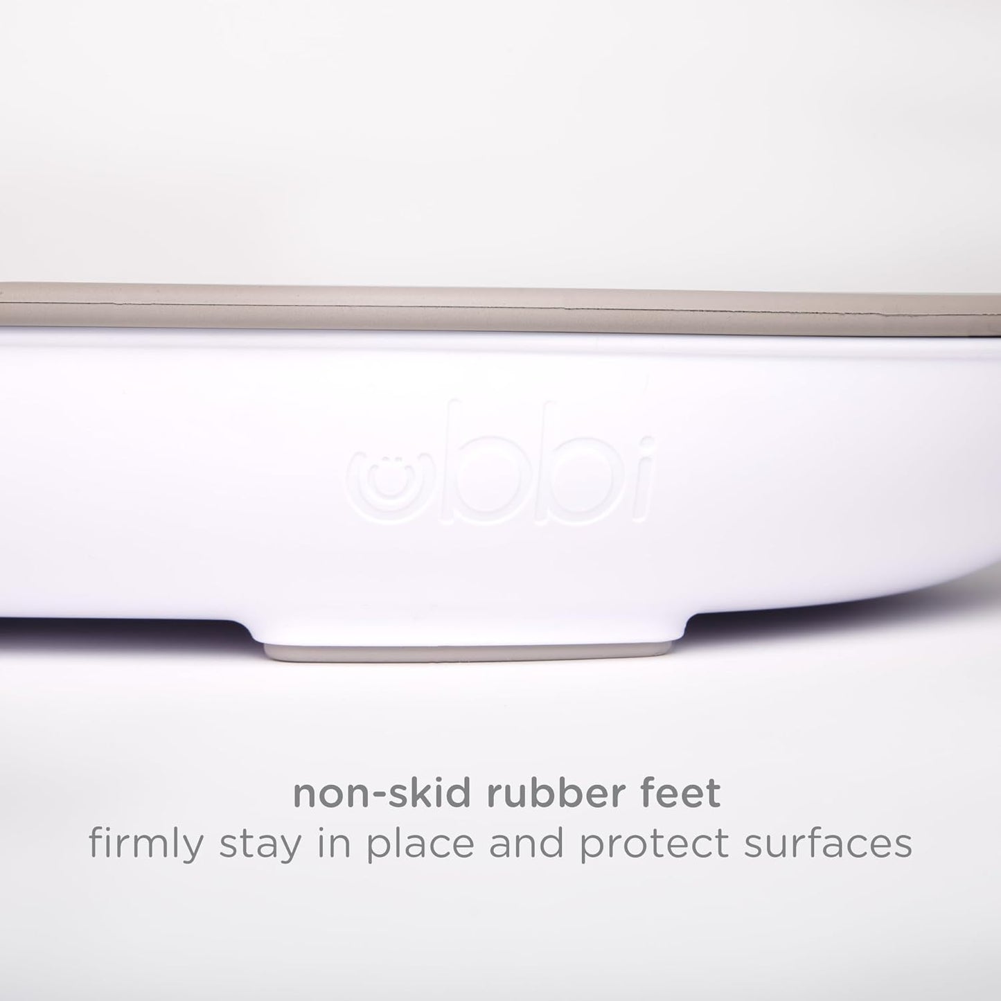 Ubbi Baby Foam Changing Pad, Easy to Clean with Detachable Base, Taupe | Wipeable Waterproof Foam Pad, Safety Strap & Non-Skid Feet, Easy to Clean. - Adenzo Comfies