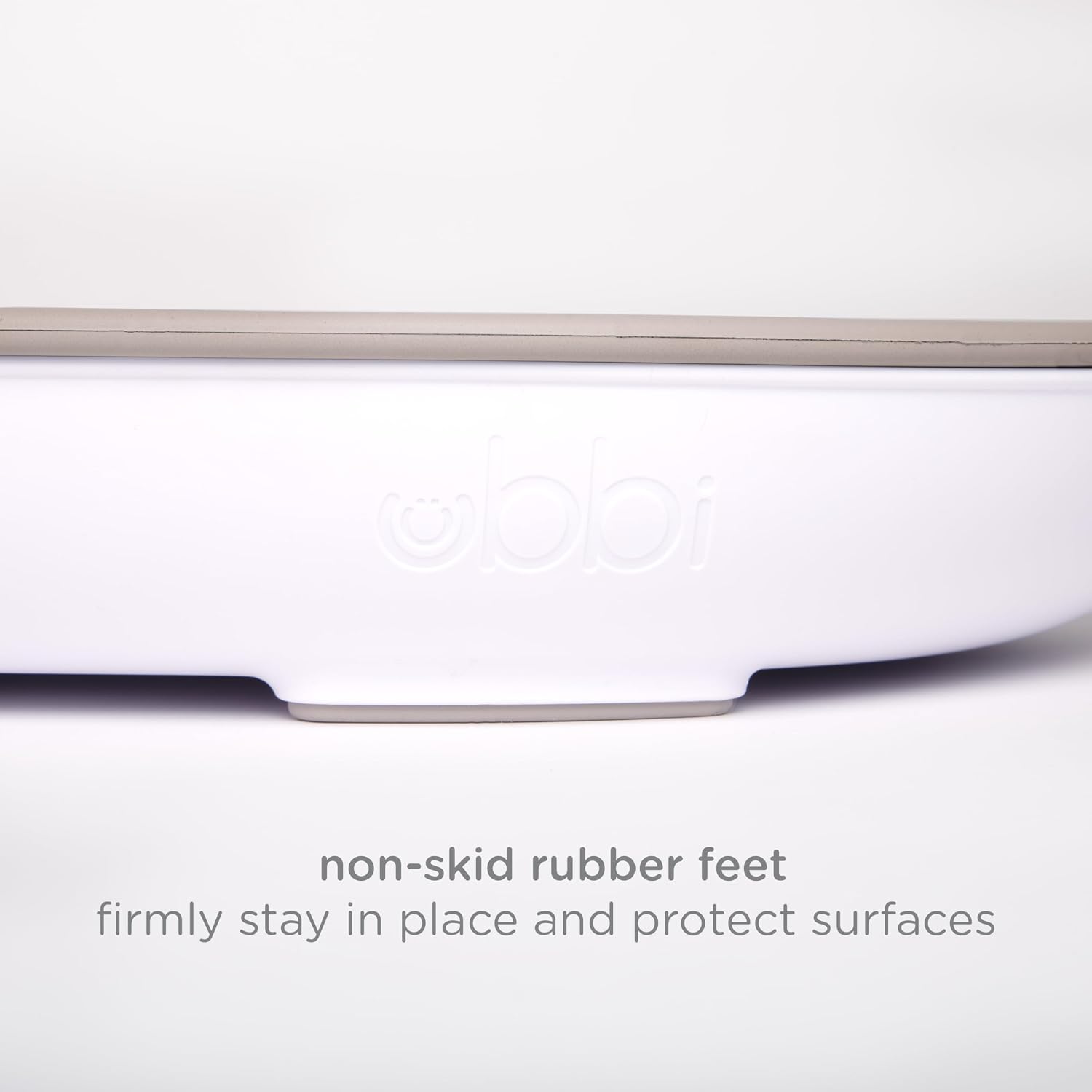 Ubbi Baby Foam Changing Pad, Easy to Clean with Detachable Base, Taupe | Wipeable Waterproof Foam Pad, Safety Strap & Non-Skid Feet, Easy to Clean. - Adenzo Comfies