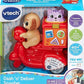 VTech Dash 'n' Deliver Scooter, Teaches Colours, Animals, Numbers, Songs & Melodies, Interactive Buttons for Role-Play Fun, Gift for Ages 12, 18, 24 Months+, English Version - Adenzo Comfies