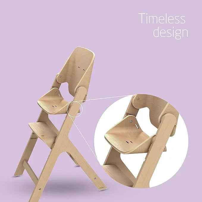 Maxi - Cosi Nesta Highchair in its natural wood finish, a stylish, adjustable wooden highchair designed to grow with a child from newborn to adult - Adenzo Comfies
