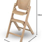 Maxi - Cosi Nesta Highchair in its natural wood finish, a stylish, adjustable wooden highchair designed to grow with a child from newborn to adult - Adenzo Comfies