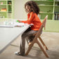 Maxi - Cosi Nesta Highchair in its natural wood finish, a stylish, adjustable wooden highchair designed to grow with a child from newborn to adult - Adenzo Comfies