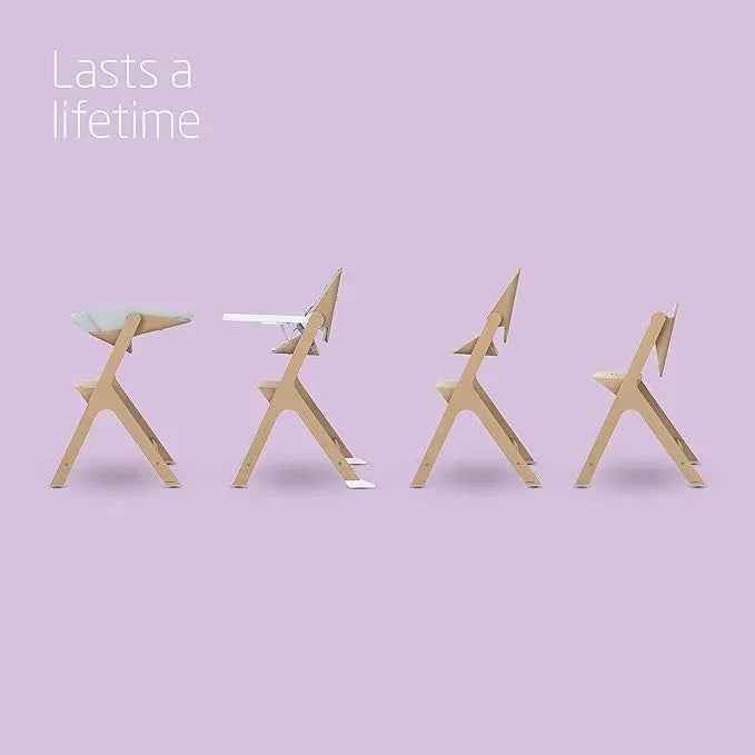 Maxi - Cosi Nesta Highchair in its natural wood finish, a stylish, adjustable wooden highchair designed to grow with a child from newborn to adult - Adenzo Comfies