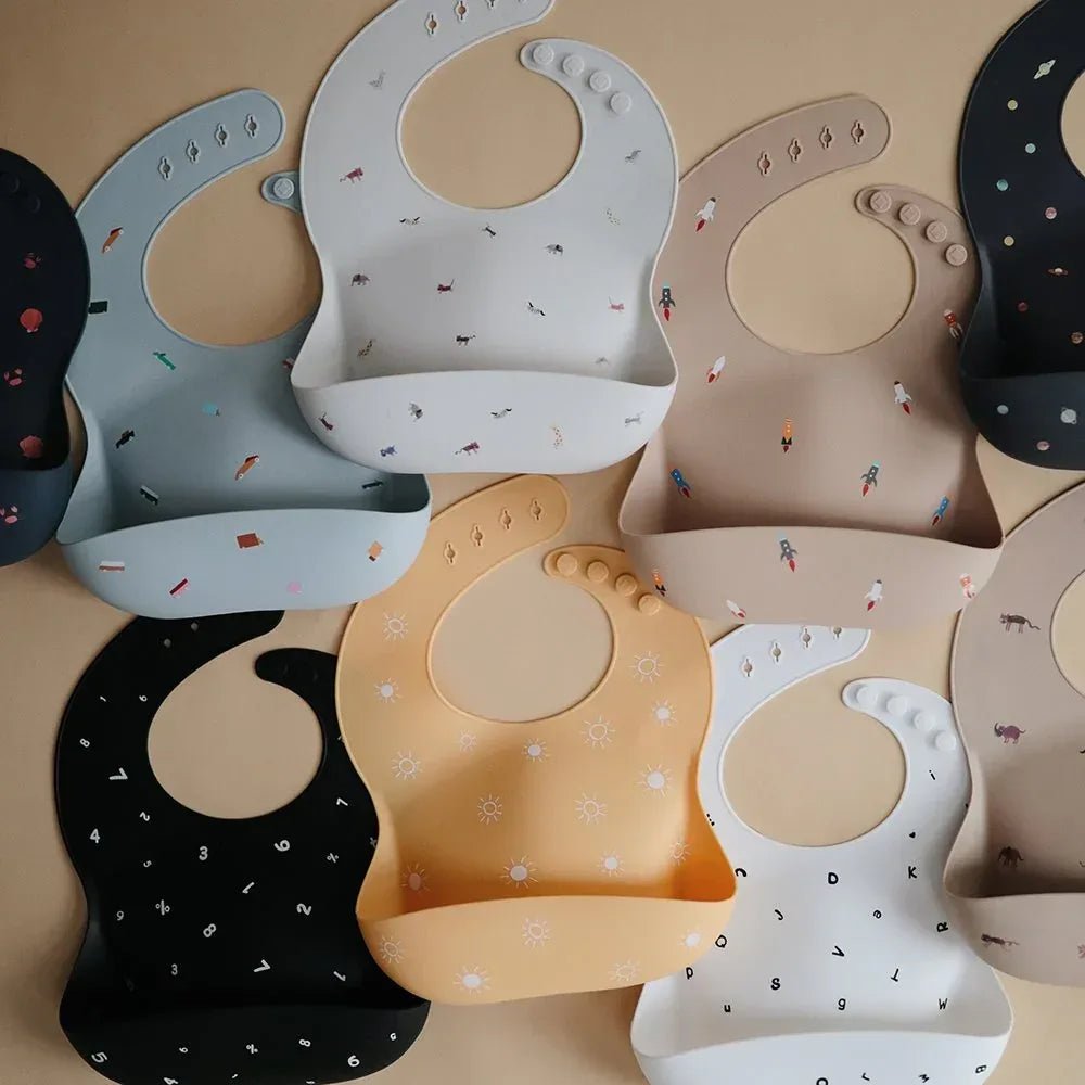 Mushie Silicone Baby Bib – Adjustable Fit Waterproof Bib – Shells Smoke - Adenzo Comfies
