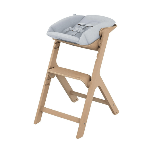 Maxi - Cosi Nesta Highchair in its natural wood finish, a stylish, adjustable wooden highchair designed to grow with a child from newborn to adult - Adenzo Comfies