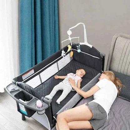5-in-1 Baby Bassinet Bedside Sleeper & Playard with Changing Table – Rocking Crib, Mesh Sides, Music Box, Mosquito Net, Storage & Travel-Friendly Design