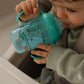 Grip n Sip No - Spill Baby Training Cup (240ml) – SoftFlex Silicone Spout Sippy Cup with Easy - Grip Handles, BPA - Free Toddler Cup (4+ Months) - Adenzo Comfies