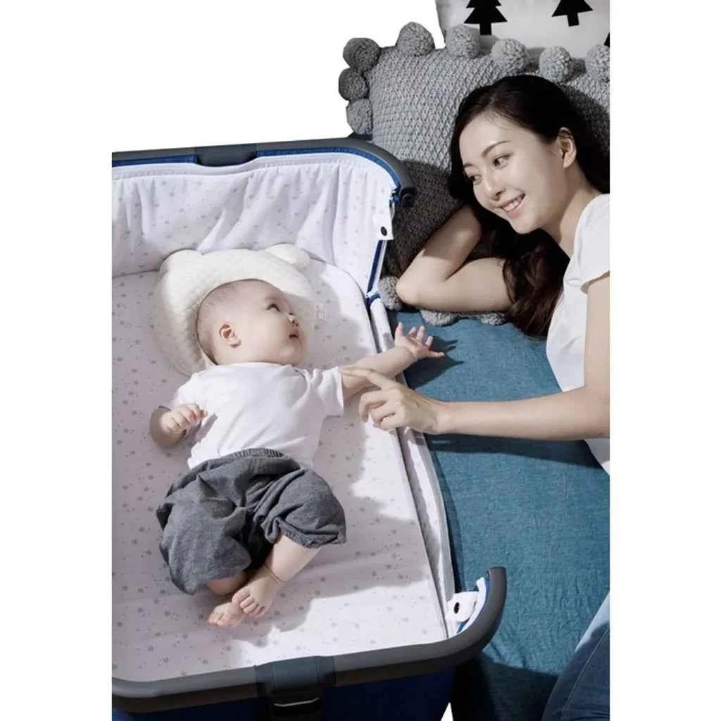Playkids 3 - in - 1 Baby Bedside Crib with Mattress & Wheels | Adjustable Baby Cot with Mosquito Net, Storage Basket & Travel Bag - Adenzo Comfies