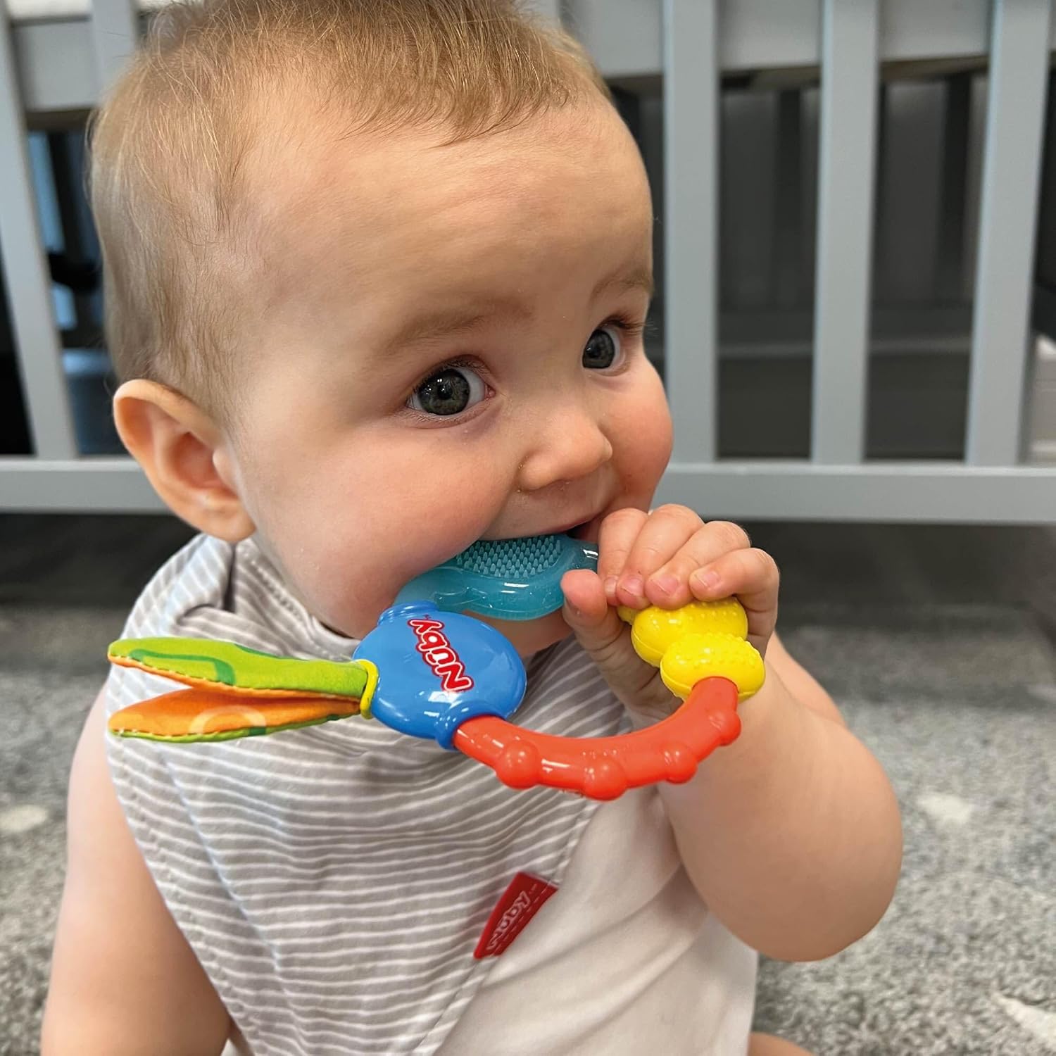 Nuby Wacky Teething Ring – Multi - Texture Silicone & Ribbon Teether for Infants, 4+ Months, Stimulates Gums & Senses - Adenzo Comfies