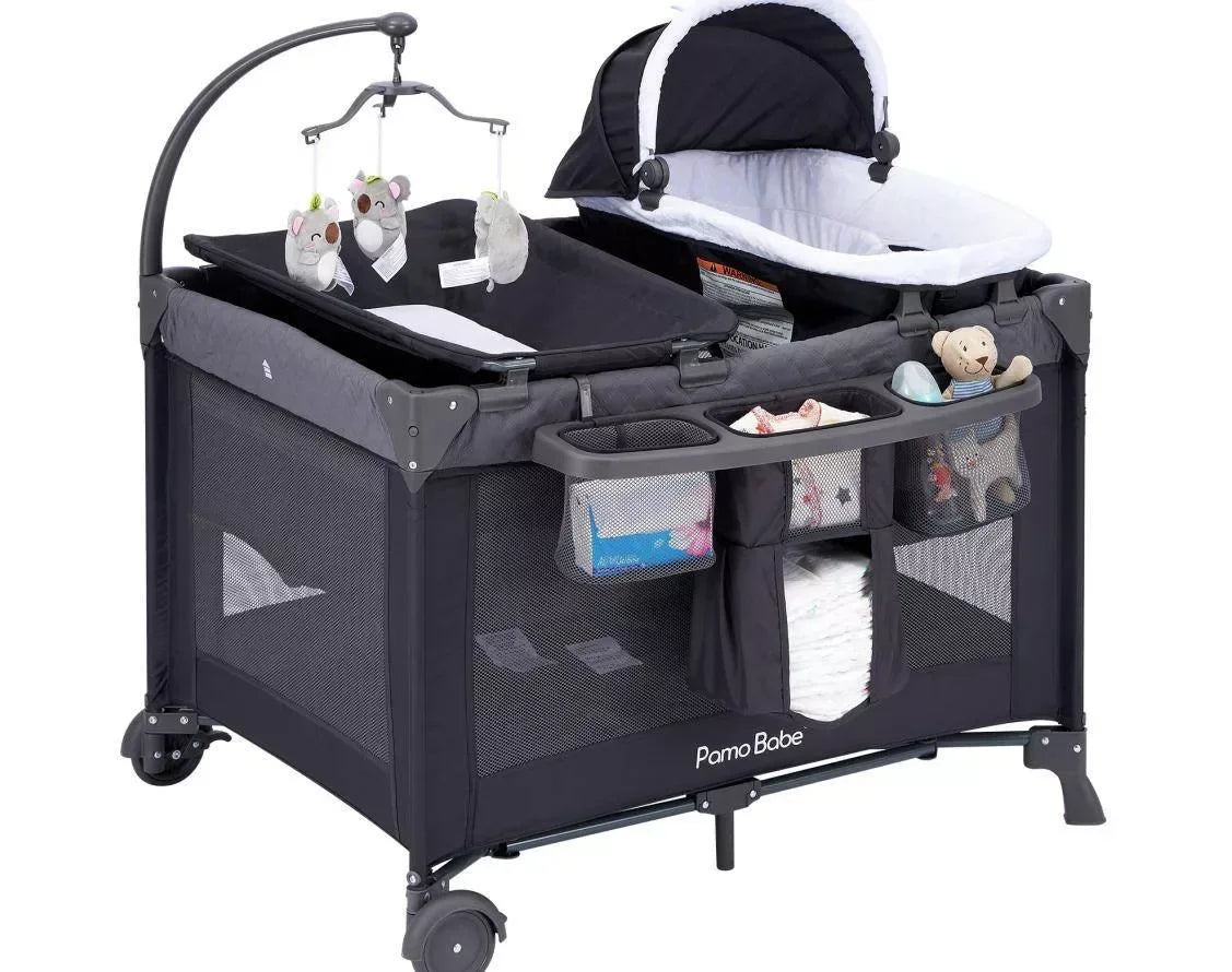 Pamo babe 4 - in - 1 Convertible Baby Playpen with Bassinet, Napper, Changing Table & Travel Bag, Portable Playard with Canopy, Wheels & Storage - Adenzo Comfies